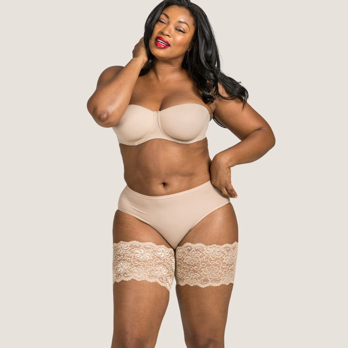 beige lace bandelettes thigh bands close up floral pattern side angle